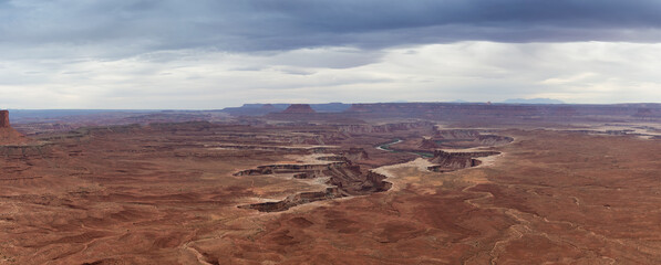 Scenic Panoramic View of American Landscape and Red Rock Mountains in Desert Canyon. Colorful Sky. Canyonlands National Park. Utah, United States. Nature Background Panorama