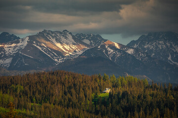 Fototapeta na wymiar Spring view of the Tatra Mountains in Poland from Spisz and Podhale. Beautiful views from one of the most beautiful places in Małopolska.