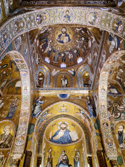 Fototapeta na wymiar The Palatine Chapel is a Sicilian-Norman style basilica, consecrated in 1140 by King Roger II. It is located within the architectural complex of Palazzo dei Normanni in Palermo.