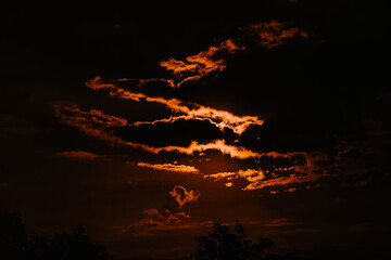 Beautiful sunset sky with golden clouds. Panorama view