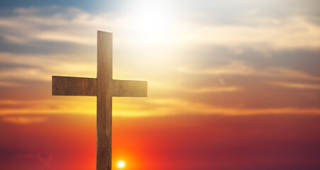 Cross at sunset, crucifixion of Jesus Christ