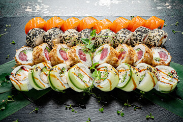 tasty sushi on the black stone