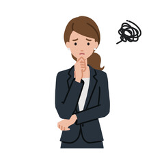 立って手をあごにあてて困っているスーツの女性