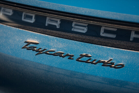 Porsche Taycan Turbo first luxury electric auto logo at the thunk lid