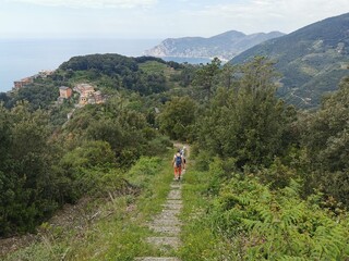 Fototapeta na wymiar Cinque Terre National Park. Trekking the hiking trail above the Cinque Terre, Italian Riviera. Liguria, Near San Bernardino. Italy