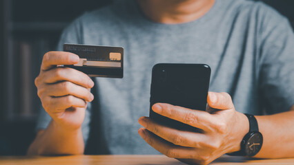 Mobile payment with wallet app technology. Man paying and shopping with smartphone application. Digital money transfer, banking and e commerce concept.