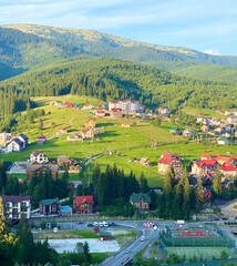 settlements in the mountains in summer among the greenery on a sunny day