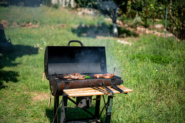 Grilled pork breast and sausage