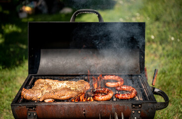 Grilled pork breast and sausage