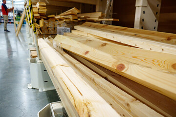 wooden boards and slabs in the hardware store. 