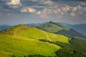 Fototapeta na wymiar Summer views in the Bieszczady Mountains - views of the mountain ranges and lakes.