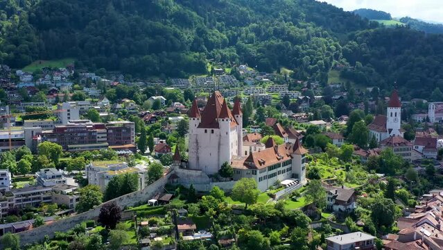 Panorama of Thun city with Alps and Thunersee lake, Switzerland. Historical Thun city and lake Thun with Bernese Highlands swiss Alps mountains in background, Canton Bern, Switzerland.