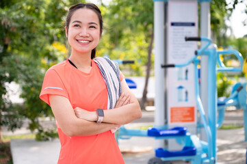 Portrait teenager woman and exercise sports area with equipment in the park	