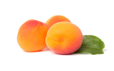 Ripe apricots with leaves isollated on white