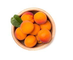 Bowl with ripe apricot isollated on white, top view