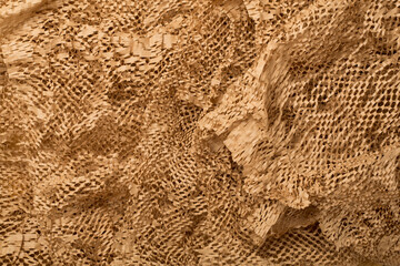 Eco-friendly honeycomb craft paper as background, top view