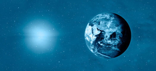 View of Planet Earth from outer space with millions of stars around it.