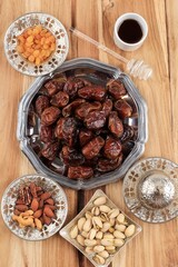 Snack for Ramadan or Eid Mubarak, Dates Fruit, Almond, Raisins, Honey, and Pistachio