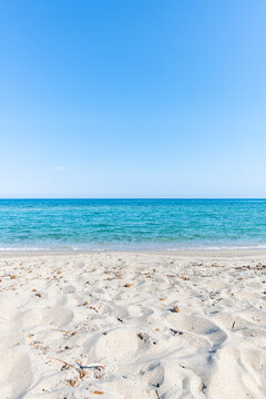 Sandy Beach and sea during summer with large copy space, Ghisonaccia, Corsica, France 