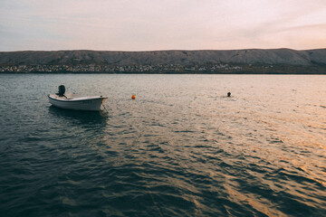 Naklejka premium Pag, Croatia beautiful landscape. Mountains and sea, vacation in the south of Europe. Beautiful sunset on the sea.