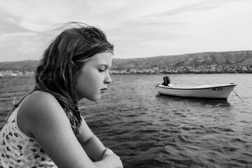 Little girl, child on the beach. Children rest on the sea in Croatia.
