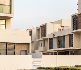 Close up shot of a facade of a modern townhouses. City