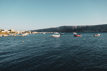 Fototapeta premium Pag, Croatia beautiful landscape. Mountains and sea, vacation in the south of Europe. Beautiful sunset on the sea.