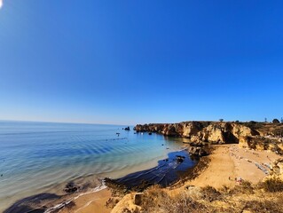 Praia Dona Ana beach with turquoise sea water and cliffs, Portugal. Beautiful Dona Ana Beach (Praia Dona Ana) in Lagos, Algarve, Portugal.
