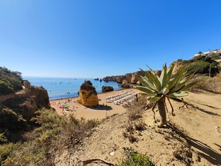 Praia Dona Ana beach with turquoise sea water and cliffs, Portugal. Beautiful Dona Ana Beach (Praia Dona Ana) in Lagos, Algarve, Portugal.
