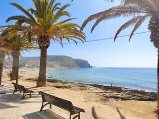 Waterfront of Praia da Luz in the Algarve. In the background the rocky coast with beach
