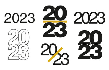 Año 2023 en diferentes formas de número sobre un fondo blanco liso y aislado. Vista de frente y de cerca