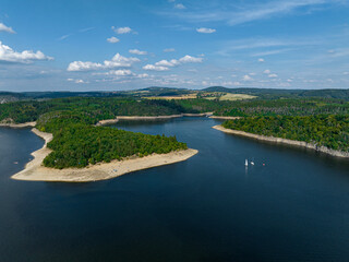 Czechia, Orlik Castle and Vltava River Aerial View. Czech Republic. Beautiful Summer Green Landscape with Orlík Water Reservoir and Boats. View from Above.  - obrazy, fototapety, plakaty