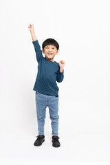 Happy Asian little boy hands up raised arms from happiness isolated on white background, Excited kid winner success concept, Looking at camera and full body composition - 526786431