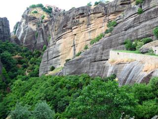 Panoramic view from Holy Trinity Monastery of Meteora in Greece high in the mountains. Unusual architecture.