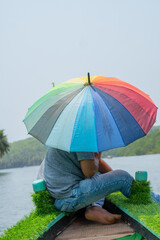 Rainbow umbrella in honnavar back waters