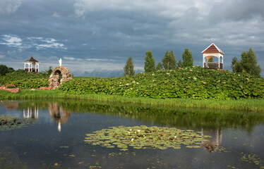 Fototapeta na wymiar Park near catholic Church of St. Anne in the village of Mosar, Belarus