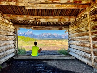 Person Looking out at the Tetons: Cunningham Cabin