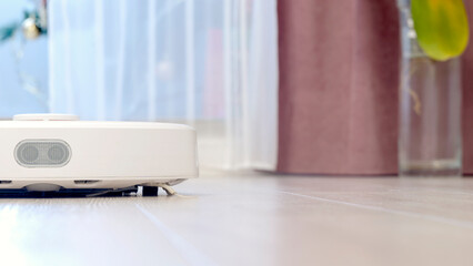 Robot wireless vacuum cleaner working on the floor