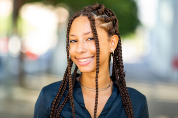 Beautiful young african woman with braided hairstyle