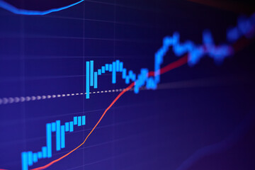 Rising stock market chart on blue background