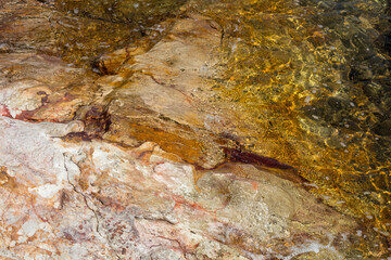 Close up view of volcanic rock by Aegean sea captured near Ayvalik town in Turkey.