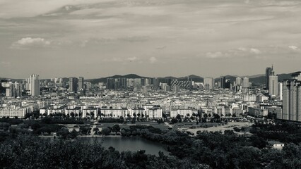 Jilin, Jilin, China - July 15 2021: The city of Jilin skyline in summer. Black and white.