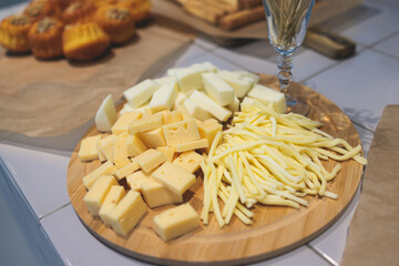 Catering banquet table, beautifully decorated with variety selection of different food snacks and appetizers on a corporate birthday party event or wedding celebration, delicatessen setting