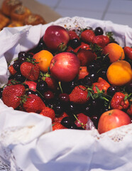 Catering banquet table, beautifully decorated with variety selection of different food snacks and appetizers on a corporate birthday party event or wedding celebration, delicatessen setting