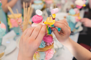 Over shake and freak shake, process of cooking extreme colorful milkshakes on a kids birthday party...