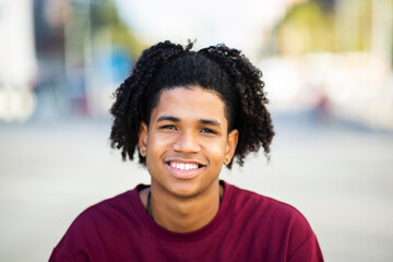 Fototapeta premium Smiling african american man outdoors in city