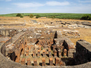 Red bricks foundations of the baths of the Pisoes Roman Villa