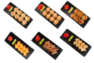 Fotobehang isolated set of 3 different types of sushi on a black marble board for your menu. Sashimi. Nigiri. Chirashi. Maki. Uramaki. Temaki. © Ritk