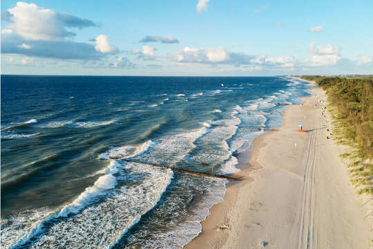 Drone aerial view of sea seashore landscape with sand beach without people, Baltic sea coastline in Poland