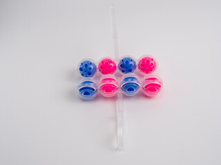 Toilet balls on a white background. Cleaning agent.